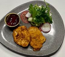 Шницель куриный с клюквенным соусом