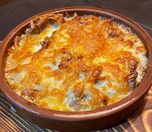 Сливочное жаркое со свининой и копченым балыком