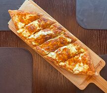 Нун. Иранская лепешка с пюре и рыбным фаршем под сыром
