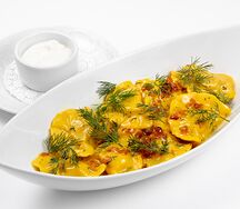 Вареники с картошкой, грибным соусом  и трюфельным маслом