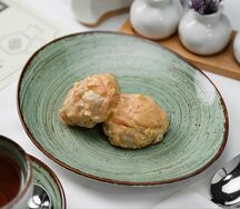 Горячее Тефтели в сливочном соусе под овощами