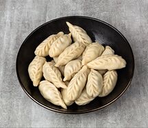 Вареники с тушеной капустой