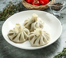 Хинкали с грибами и сыром сулугуни