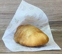 Пирожок жареный с капустой