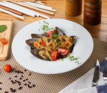 Мидии в винном соусе