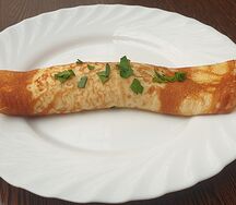 Омлет с ветчиной на сковороде