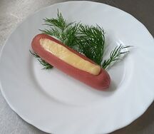 Жареная сосиска с сыром