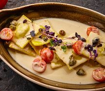 Равиоли с утрой и таджасскими оливками