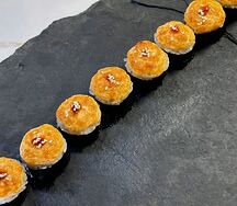 Запеченная креветка под сырным соусом