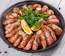 Жареные креветки Dragon в чесноке и сливочном масле 