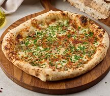 Пицца с грибным рагу, копчёным сыром и трюфельным маслом 33 см