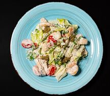 Морепродукты в сливочном соусе
