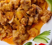 Жареная свинина в кляре с ананасами
