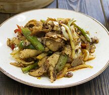 Свинина с овощами и зирой
