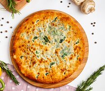 Пирог осетинский с курицей, сыром и зеленью