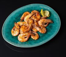 Креветки жареные в соусе