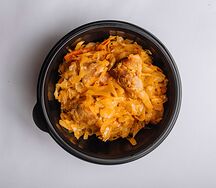 Капуста, тушенная со свининой