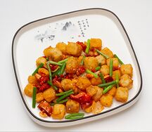 Минтай, жаренный с побегами чеснока