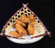 Крылышки в сухарях