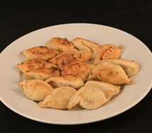 Пельмени со свининой жареные