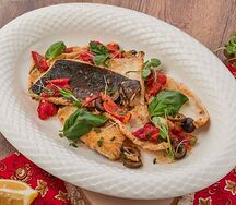 Камбала с овощами и зеленью