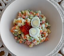 Оливье с красной рыбой и икрой