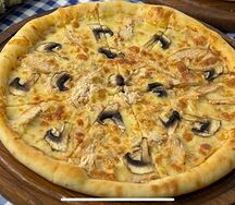 Пицца с курицей и грибами