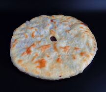 Осетинский пирог с сыром и свекольной ботвой 