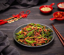 Стрелки чеснока со свининой