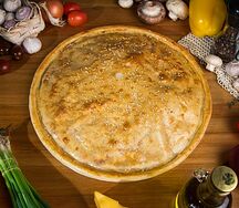 Пицца закрытая мясная