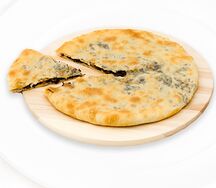Осетинский пирог с шампиньонами, луком и сыром