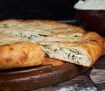 Осетинский пирог с сыром и зеленью 
