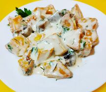 Картофель, запеченный под чесночным соусом