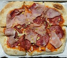Пицца с ветчиной из индейки