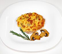 Свинина, запеченная с грибами под сырной шапочкой