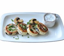 Сырники с изюмом и трюфельным маслом 