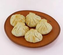 Жареные хинкали с курицей