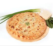 Осетинский пирог с сыром и зеленым луком