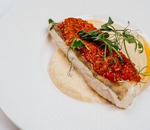 Волжский судак на картофельном креме с соусом из сладкого перца