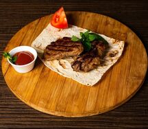 Стейк говяжий в томатном соусе