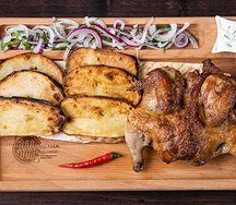 Цыпленок тапака с картофелем плеч