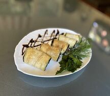 Рулеты из баклажанов с овощами и сыром