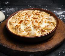 Пельмени под сырной корочкой